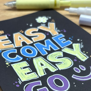 Handlettering auf schwarzem Papier